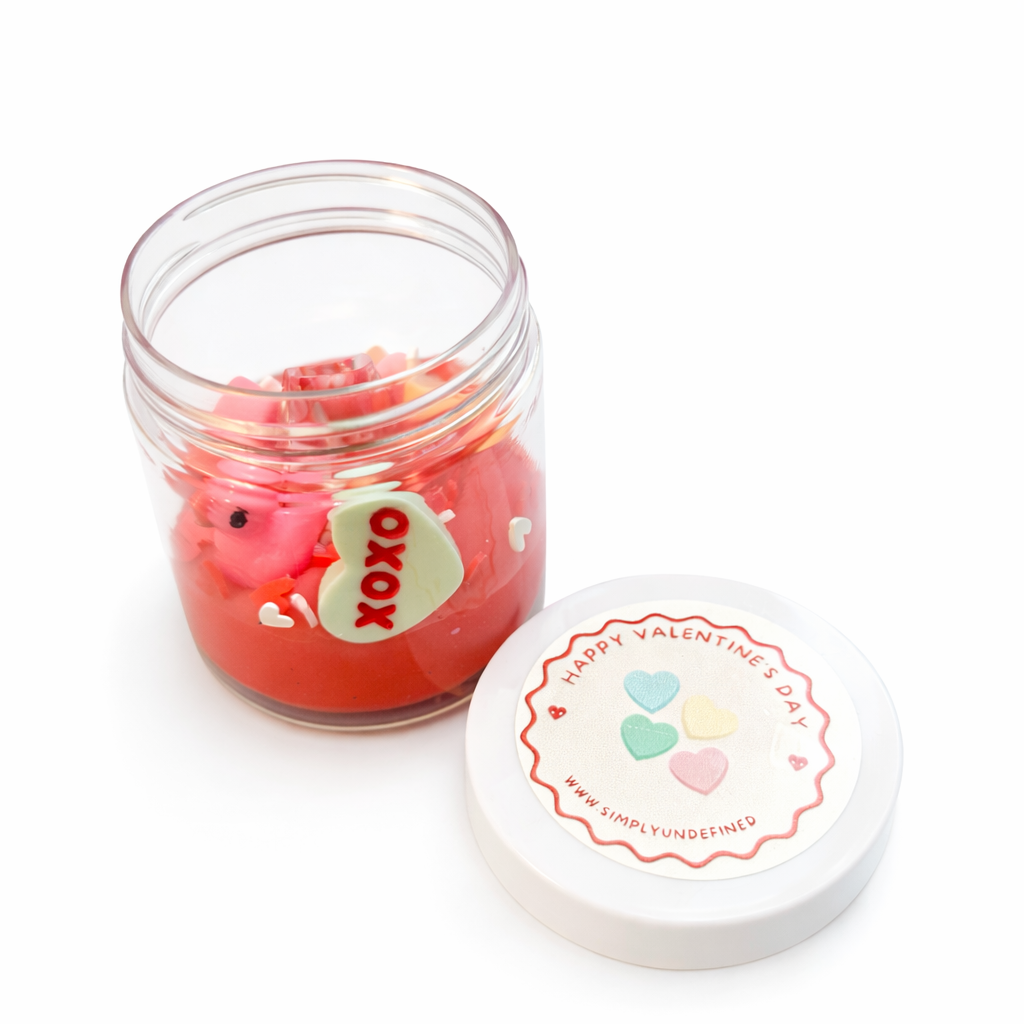 Happy Valentine’s Day Sensory Dough Jar with red dough and valentine heart charms